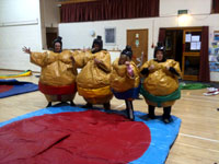 Sumo wrestling suits & 12ft x 12ft wrestling mat �60